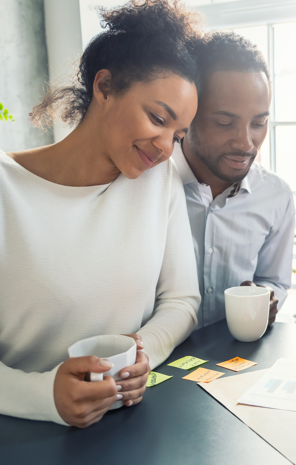 Young couple listening attentively to a financial advisor