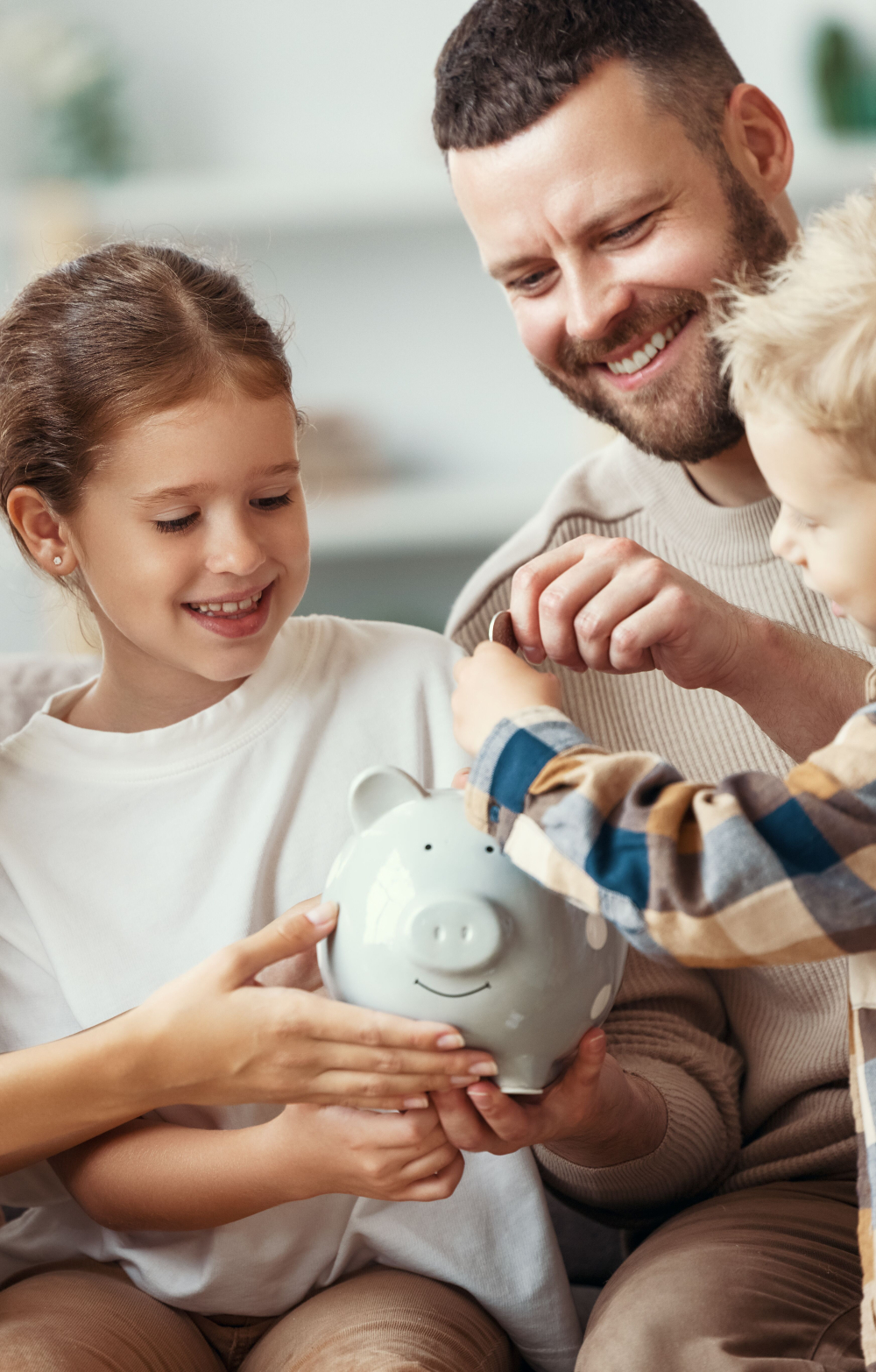 Family putting money in savings bank